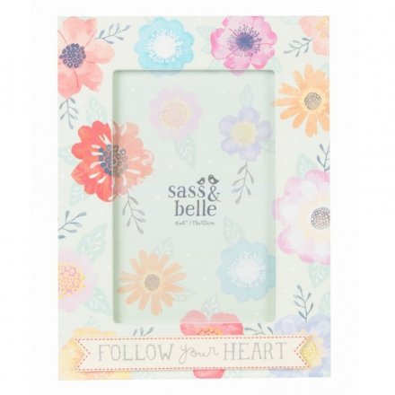 A pretty pastel coloured photo frame with 'Follow Your Heart' text.