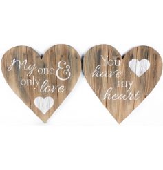 2 assorted rustic heart plaques with painted slogans.