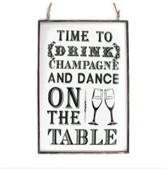 Popular champagne text on a glass hanging plaque