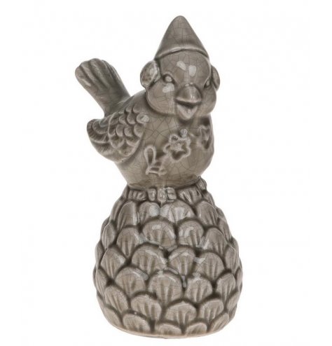 A festive bird perched upon a pinecone in dark grey tones and finished with a crackle glaze effect. 