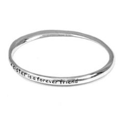 A gorgeous silver bangle engraved with the slogan 'A sister is forever a friend'