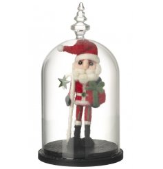 A wool santa ornament set within a decorative dome.
