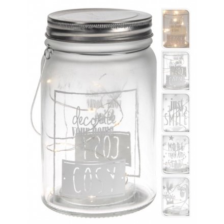 On trend mason jars with xmas slogans and LED lights.