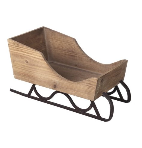 A table top sized wooden sleigh with metal base. Ideal for displaying ornaments, decorations and gifts.