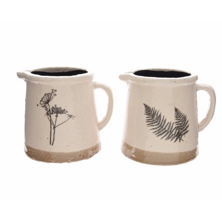 An assortment of 2 rustic style stoneware jugs with a natural print design.