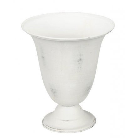 A shabby chic style white urn. A stylish decorative accessory for the home.