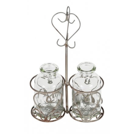 A miniature twin milk bottle holder with bottles. A chic decoration, ideal for popping a sprig of flowers in.