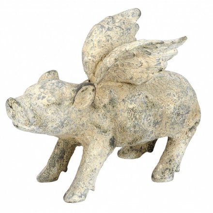A unique and on trend stone pig ornament with wings. A chic accessory with a distressed finish, ideal for the garden!