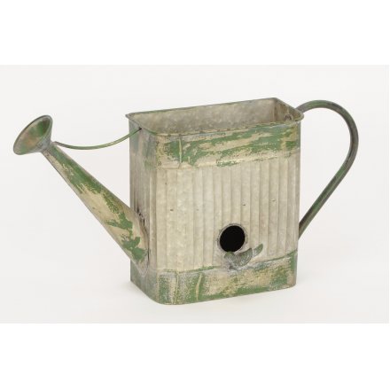 A rustic style metal birdhouse in the shape of a watering can. A unique decorative accessory for the garden!