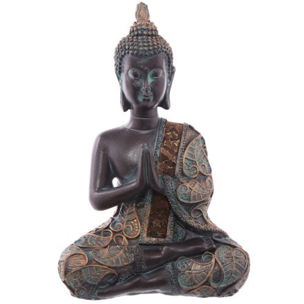 An assortment of 4 thai sitting buddha ornaments with a rich gold and aqua finish.