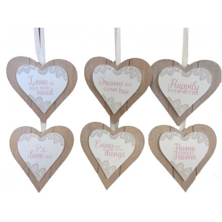 An assortment of 6 heart shaped plaques with a delicate lace design and love slogans.