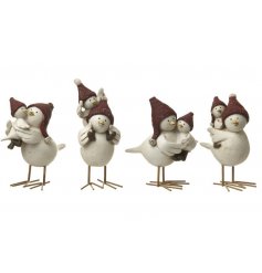 An assortment of 4 mother and baby bird christmas ornaments 
