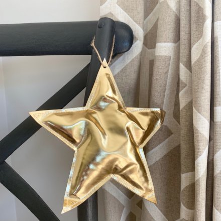 A simple and chic gold fabric star hanger with jute string.