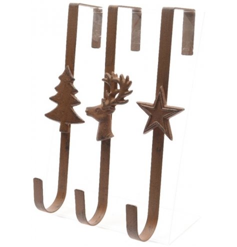 Hang your much loved Christmas wreath with ease using these rustic iron wreath hangers in tree, stag and star designs.