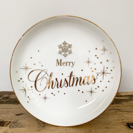 A glamorous ceramic trinket dish from the popular Mad Dots range. Complete with a star design and snowflake gem.