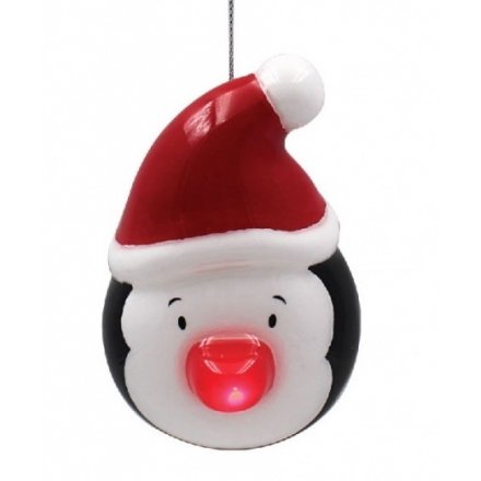 A cute and fun Penguin face bauble with a flashing LED red nose. A must have festive item this season.