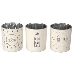 3 beautifully assorted white winter wonderland themed candle pots, each designed with a quirky christmas look 