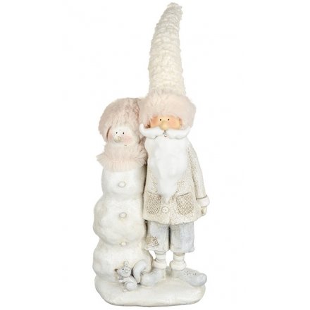 This sweet standing resin santa figure will look great with any Winter Wonderland theme 