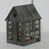  Complete with its worn down grey walls, this house shaped lantern will bring a delicate glow wherever it goes 