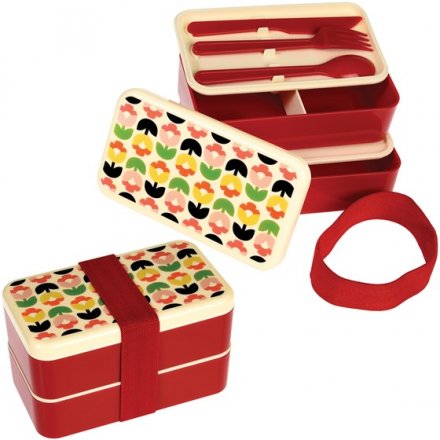 A stylish and unique Bento Box with two compartments, knife, fork and spoon.