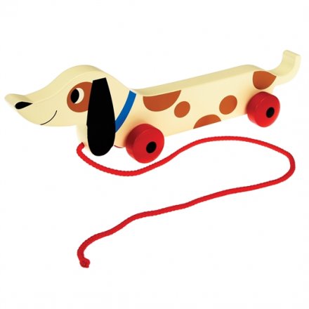 A charming wooden sausage dog pull toy with red wheels and rope. A fantastic gift item.