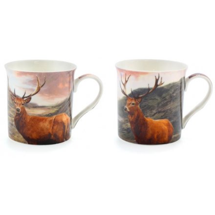  An assortment of 4 differently pictured ceramic stag themed mugs,