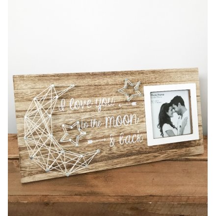  A beautifully simple wooden photoframe, with an added string art design 