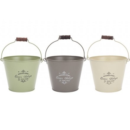  An assortment of garden planter buckets in a mix of colours and added vintage print decal 