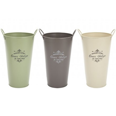 An assortment of garden planter buckets in a mix of colours and added vintage print decal 