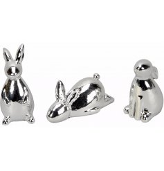  Bring an simple yet elegant touch to any space of the home with these chic silvered rabbits 