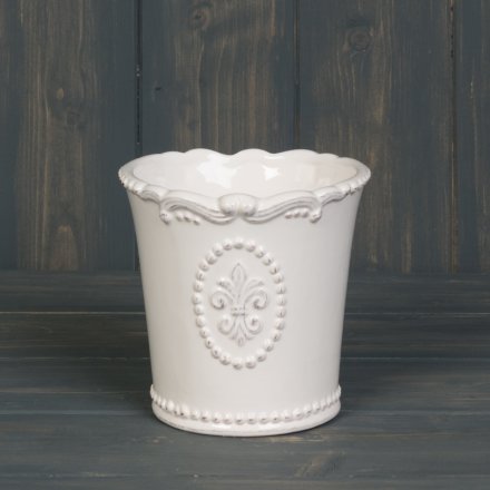 A beautifully smooth glaze finished ceramic pot, complete with a embossed Fleur De Lis