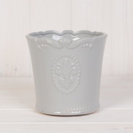 A beautifully smooth glaze finished ceramic pot, complete with a embossed Fleur De Lis