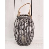 A large grey woven lantern with rope handle