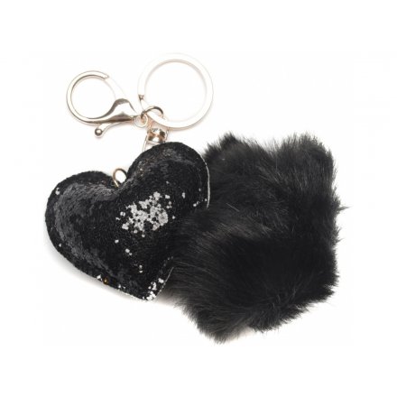 Bring an extra touch of glitter to your handbag with this glam sequin heart and pompom key ring 