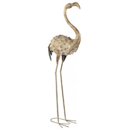  Bring an almost Alice In Wonderland theme to any home or garden with this stylishly chic metal standing Flamingo 