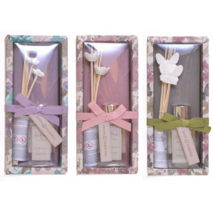 A floral themed assortment of scented clay reed diffusers