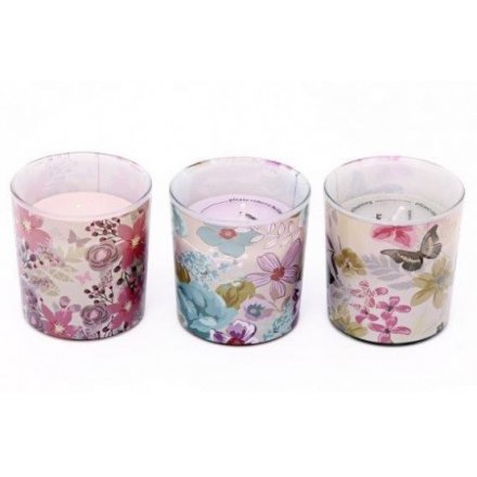 An assortment of 3 floral pattern candle pots