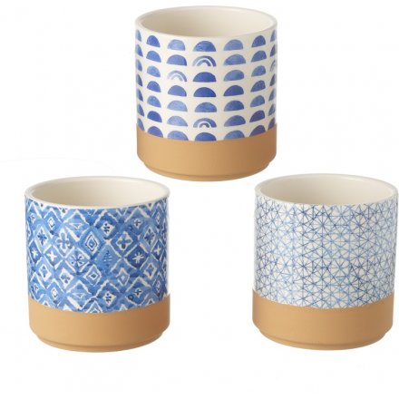 An on trend assortment of blue toned ceramic decorative planters