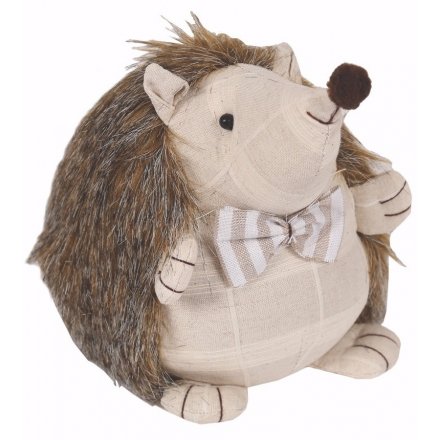 Add a classical vintage tone to your home spaces with this fabric hedgehog doorstop 