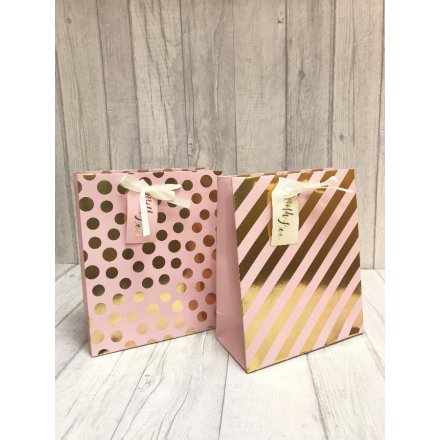 An assortment of 2 Pink & Gold medium Gift Bags