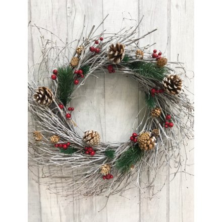 Introduce a rustic woodland inspired charm to any home space or front door with this twig scattered wreath