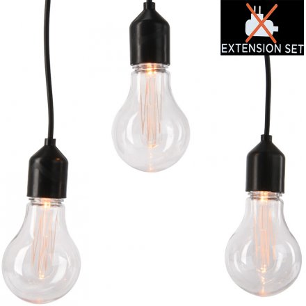 Set with a filament LED inspired look these warm glowing bulbs strung along a chunky black wiring will be sure to bring 