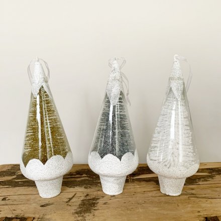 Unique cone shaped tree decorations filled with sparkling white, silver and gold bristle Christmas trees. 