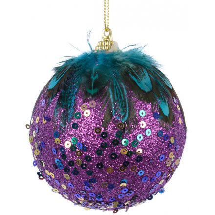 this sequin covered and peacock feather topped foam bauble will be sure to stand out in any Christmas tree