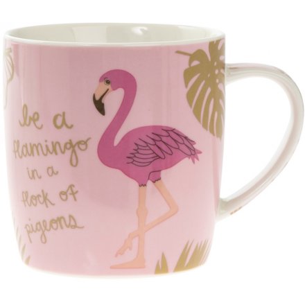 A ceramic mug with Be A Flamingo motto