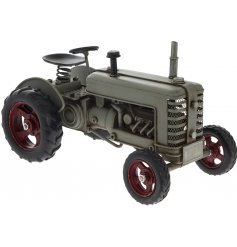 Set with its realistic features and distressed details, this metal tractor will look perfect in any study or shelf space