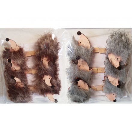  Hang your christmas cards in style with this cute assortment of fuzzy hedgehog pegs 