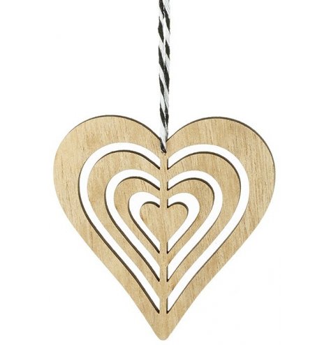 A wooden heart shaped hanging decoration with a black and white candy cane ribbon hanger.