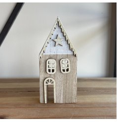 Add a winter touch to any home decor or christmas display with this chic wooden house decoration