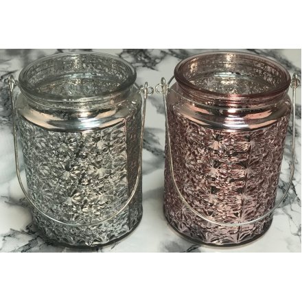 An assortment of 2 Pink/Silver Glass Tealight Lanterns